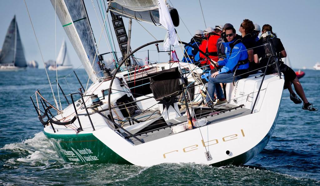 Sir Ben Ainslie and his team onboard Rebel.<br />
All eyes firmly on the JP Morgan Asset Management Round the Island Race 2014. © Th.Martinez/onEdition