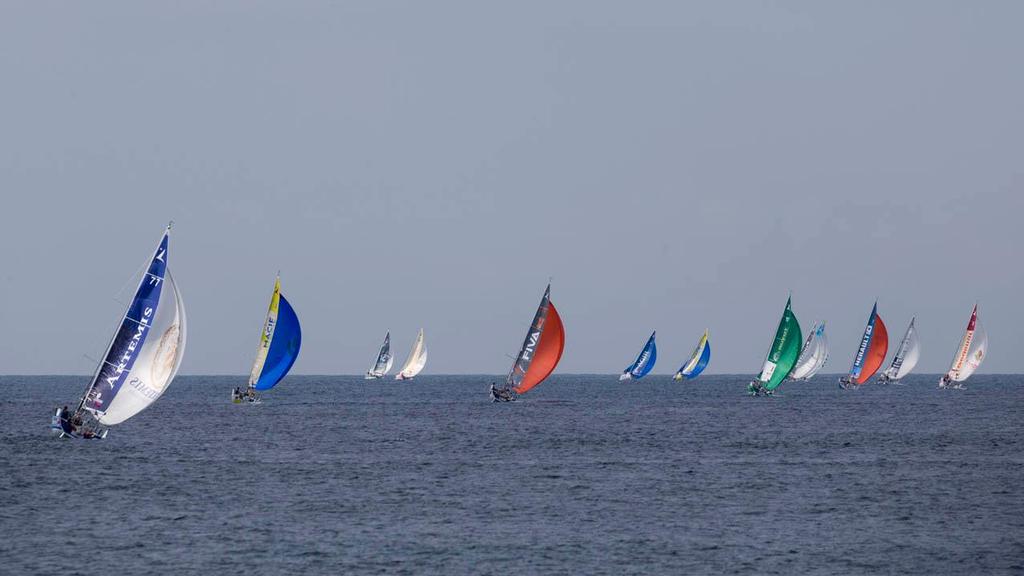 Les Figaros au passage du phare du Fastnet lors de la 2eme etape de la Solitaire du Figaro Eric Bompard Cachemire 2014 entre Plymouth et Roscoff © Alexis Courcoux