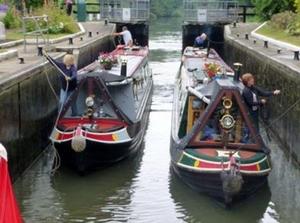 ``Two ladies of the house securing lines on their narrow boats``  - A Beer Bummel on the Thames River photo copyright The Galley Guys taken at  and featuring the  class