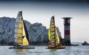 Wandering Glider battles rival boat as they meet the traitorous Isle of Wight landmark, The Needles. Navigating around their sharp and jagged rocks will be no easy feet. All eyes firmly on the JP Morgan Asset Management Round the Island Race 2014. - JP Morgan Asset Management Round the Island Race 2013-14 photo copyright onEdition http://www.onEdition.com taken at  and featuring the  class