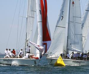 Melges 20s of Elliott James (l.) and  Skip Shapiro meet at leeward gate photo copyright Rich Roberts taken at  and featuring the  class