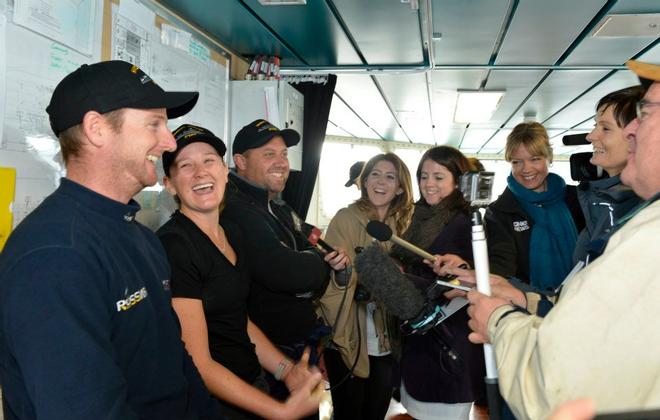 Django skipper Ben Costello with crewmates Bex Heikema and Andrew Cooke being interviewed on the bridge. - Django crew arrive ashore at Devonport Naval Base July 9, 2014 © New Zealand Defence Force