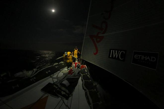 Justin Slattery and Luke Parkinson work by the light of a full moon - Abu Dhabi Ocean Racing - Trans Atlantic Return crossing July 2014 © Abu Dhabi Ocean Racing (ADOR) 
