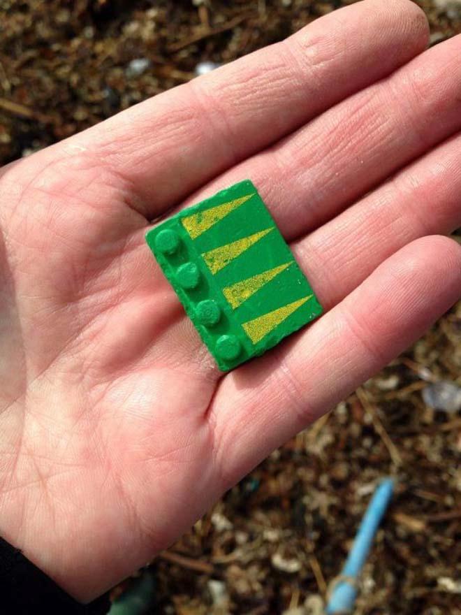Alex Simmons found two of these green and yellow Lego pieces at Godrevy in Cornwall. © Tracey Williams https://www.facebook.com/LegoLostAtSea/