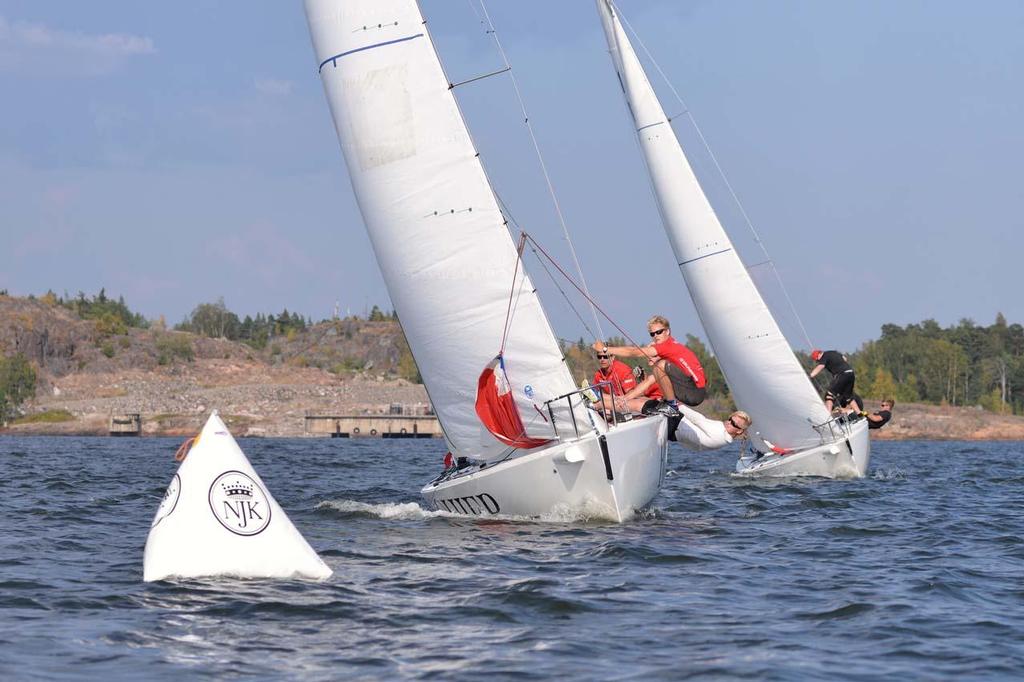 Danish team approaching upper mark - ISAF Youth Match Racing World Championship 2014 - Day 1 photo copyright Erik Lahteenmaki / Sailpix.fi http://www.sailpix.fi taken at  and featuring the  class