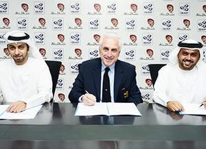 Sultan Al Dhaheri (left); Carlo Croce and Ahmed Al Romaithi seal the deal. - ISAF Sailing World Cup Final 2014 photo copyright ISAF  taken at  and featuring the  class