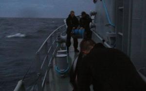 HMNZS Otago prepares to launch a swimmer to cross to the Django as daylight fades fast photo copyright New Zealand Defence Force taken at  and featuring the  class