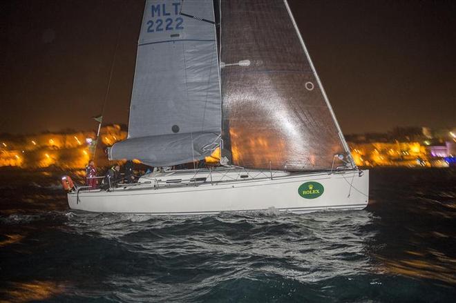 Artie crossing the finish line at Marsamxett Harbour to become the winner of the 2014 Rolex Middle Sea Race. ©  Rolex/ Kurt Arrigo http://www.regattanews.com