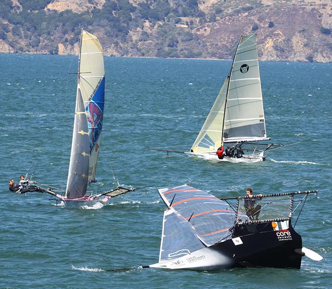 Skip McCormack's 18 flips on first tack after the start of Race four - 2014 18' Skiff International Regatta © Rich Roberts