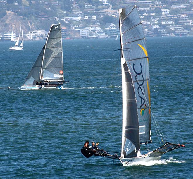 Howie Hamlin (l.) never capsized   but couldn't quite catch ASCC (r.) © Rich Roberts