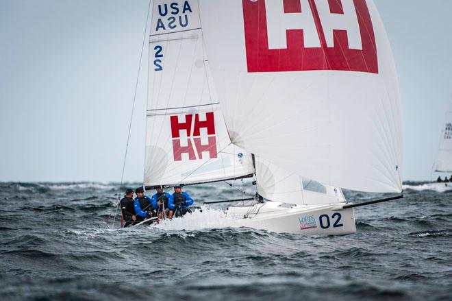 Jamestown’s Tim Healy (second from left) steers Helly Hansen. © Paul Todd/Outside Images http://www.outsideimages.com