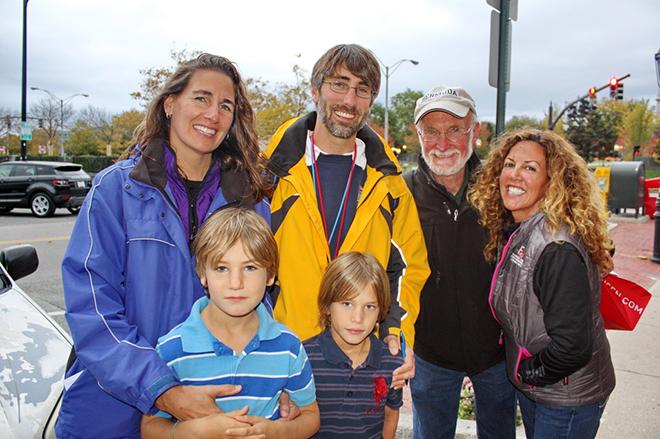 Matt Warren (yellow jacket) will meet his family in Bermuda after they fly there and is getting assistance aboard Tashtego from professional captain David Lyman and crew member Christine Perakis (on right). © OPO http://www.sailopo.com/