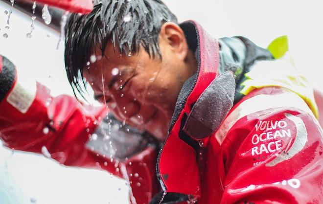 October 23, 2014. Leg 1 onboard Dongfeng Race Team. Jiru Yang during some fast, upwind sailing - Volvo Ocean Race 2014-15. &copy; Yann Riou / Dongfeng Race Team