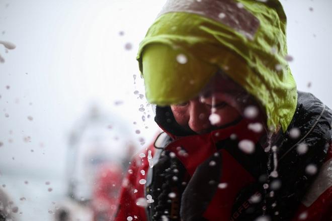 November 3, 2014. Leg one onboard Dongfeng Race Team. Day 23 was a wet day for Jiru Yang - Volvo Ocean Race 2014-15 © Yann Riou / Dongfeng Race Team
