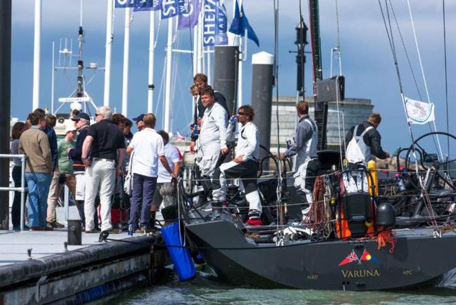 The yacht's designer, Jason Ker, spectators and the RORC Race team on the dock to greet the crew of Varuna at Trinity Landing, Cowes after the finish. © Hamo Thornycroft http://www.yacht-photos.co.uk