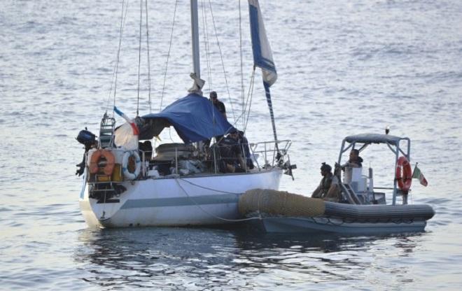 Stricken yacht - EU Naval Force Flagship ITS Doria and Frigate ESPA Navarra assist Yacht in distress in Gulf of Aden © EUNAVFOR 2014