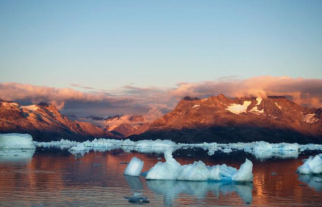 Icebergs calving from Helheim Glacier drift into Sermilik Fjord, posing a danger to instruments deployed in the fjord. © Woods Hole Oceanographic Institution (WHOI) http://www.whoi.edu/