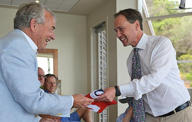 The Hon Greg Hunt MP, Member for Flinders presents SSCBC Commodore, Andrew Plympton, with the Australian flag. © Matt Mackay