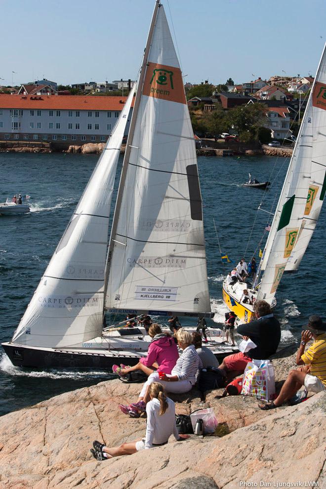 Spectators at Lysekil Women's Match overlooking the pre start manoeuvres of local hero and reigning World Champion Anna Kjellberg (left boat), in her match against American Stephanie Roble (right boat). &copy; Dan Ljungsvik / LWM