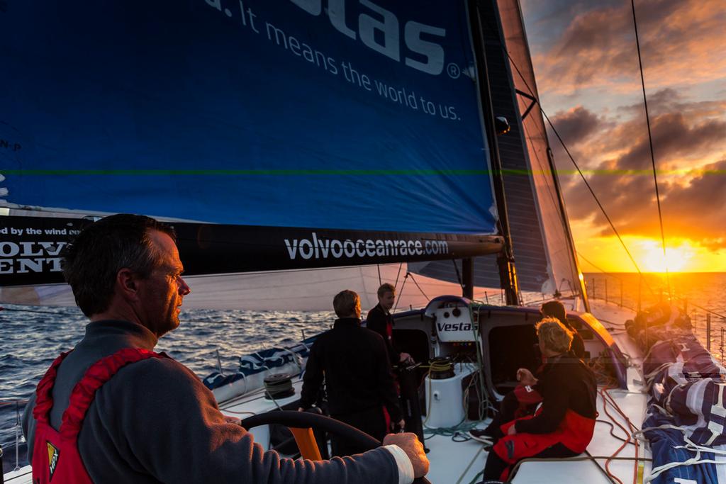 Chris Nicholson drives into the morning sunrise off the African Coast going through the Straits of Gibraltar. © Brian Carlin - Team Vestas Wind