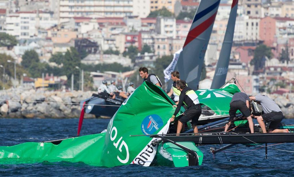 2014 Extreme Sailing Series, Act 6 - Groupama dismasted © Lloyd Images/Extreme Sailing Series