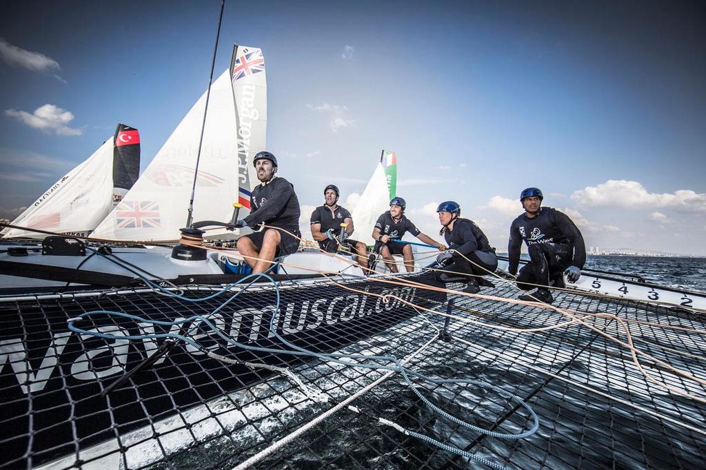 2014 Extreme Sailing Series, Act 6 - Onboard with The Wave, Muscat as they race downwind, the rest of the fleet in the background. © Lloyd Images/Extreme Sailing Series