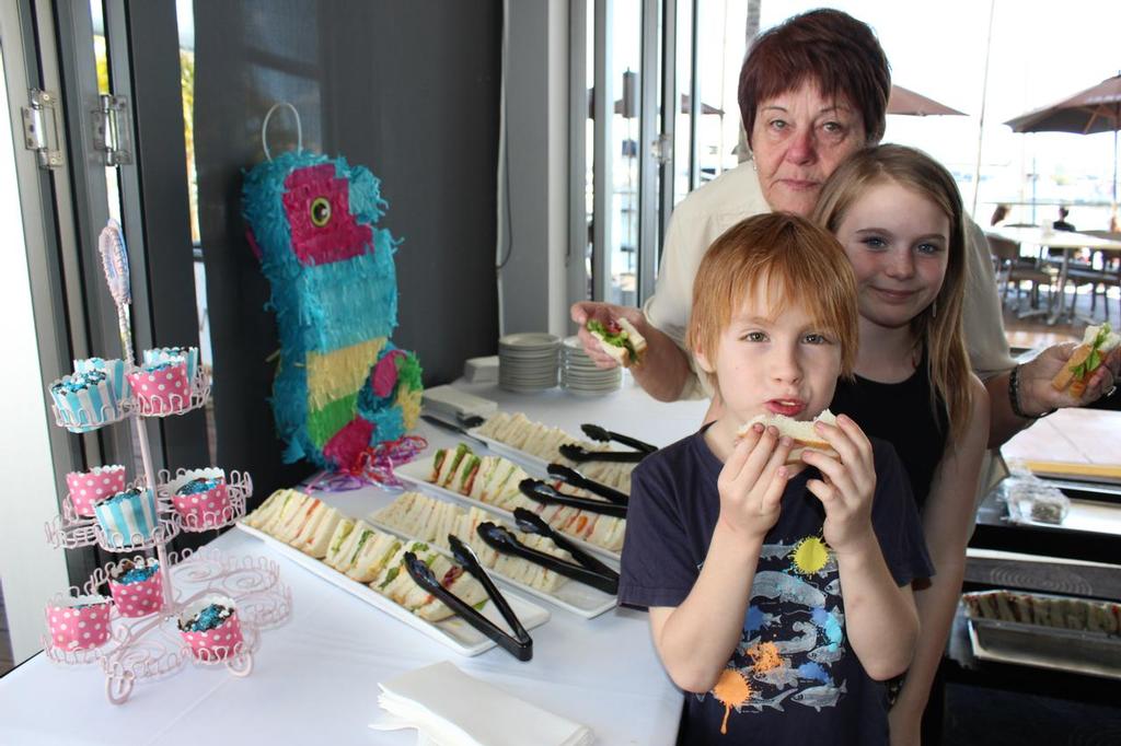 Yum! Sandwiches, fairy bread, sausage rolls and pies, with plenty of sauce! © Jeni Bone