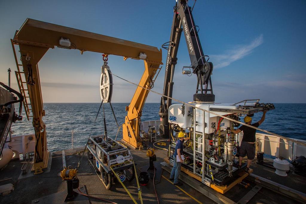 The smaller ROV Seirios operates as a camera platform above the larger ROV Deep Discoverer which explores close to the seafloor. Deep Discoverer has a range of capabilities and both vehicles have high-definition video cameras and bright lights. ©  NOAA Okeanos Explorer Program