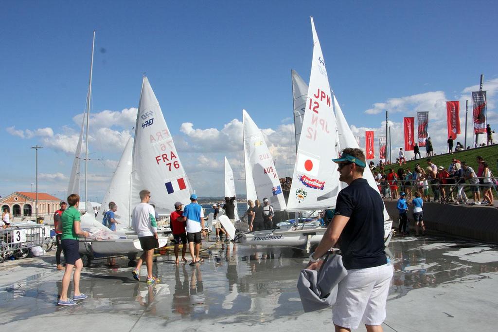 470s returning to boat park after medal race - 2014 ISAF Sailing World Championships Santander photo copyright Sail-World.com http://www.sail-world.com taken at  and featuring the  class