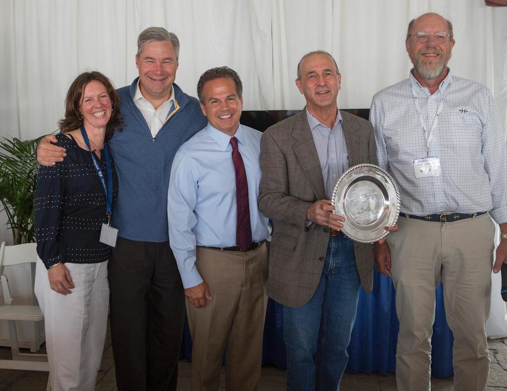 Eric Goetz received the 2014 RIMTA Anchor Award at the organizationâ€™s Annual Industry Breakfast on September 13 in Newport, R.I. From left: RIMTA CEO Wendy Mackie, Senator Sheldon Whitehouse, Congressman David Cicilline, Eric Goetz, Peter Van Lancker. photo copyright Billy Black http://www.BillyBlack.com taken at  and featuring the  class
