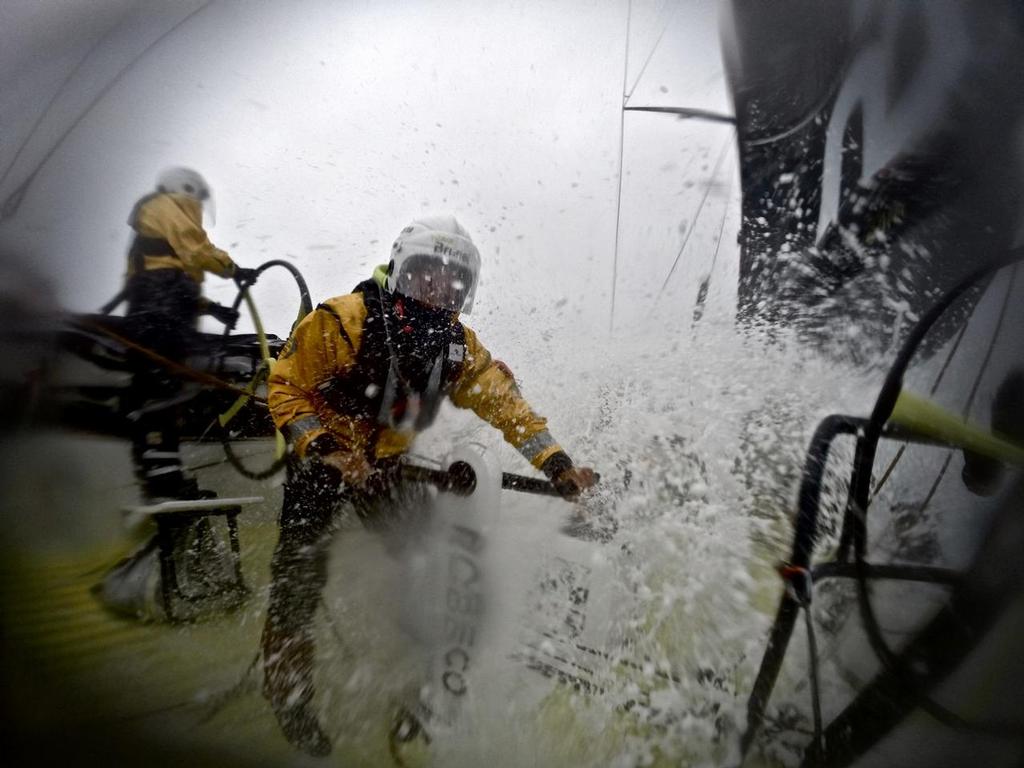 November 3, 2014. Leg 1 onboard Team Brunel. On the grinder trimming the sails after a sail change.  © Stefan Coppers/Team Brunel