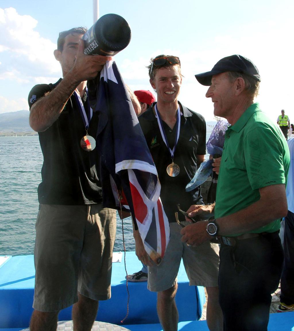 Belcher, Ryan and Victor celebrating - 2014 ISAF Sailing World Championships Santander photo copyright Sail-World.com http://www.sail-world.com taken at  and featuring the  class