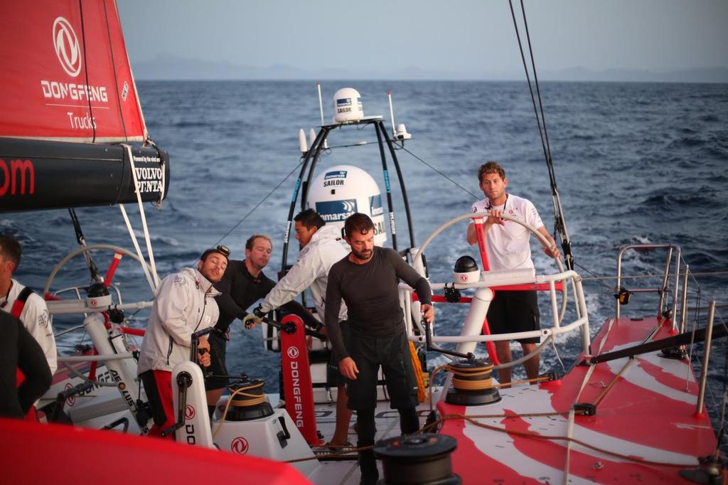 October 18, 2014. Leg 1 onboard Dongfeng Race Team, Island of Sao Nicolau (Cape Verde) visible behind. © Yann Riou / Dongfeng Race Team