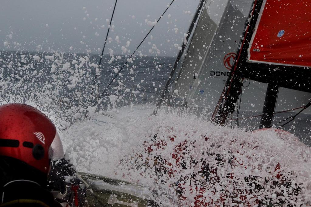 October 31, 2014. Leg 1 onboard Dongfeng Race Team. Lots of water on deck when sailing South. © Yann Riou / Dongfeng Race Team