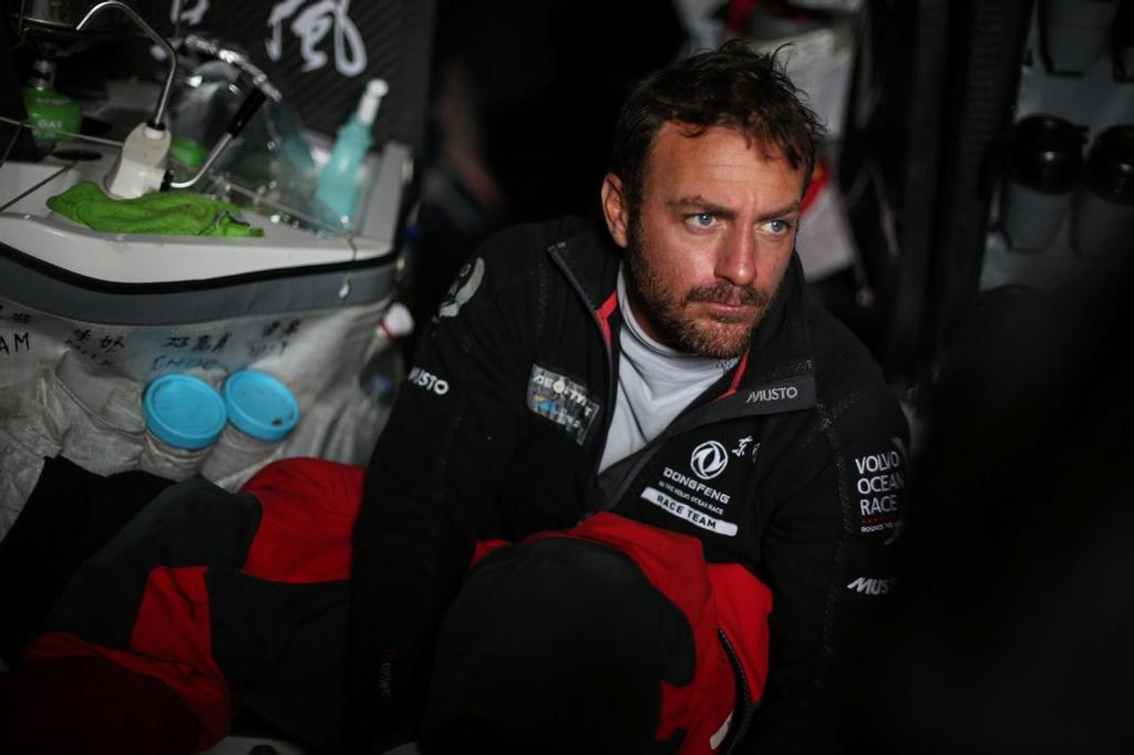 November 2, 2014. Leg 1 onboard Dongfeng Race Team. Eric Peron, waked up in the off-watch to change sail.  © Yann Riou / Dongfeng Race Team