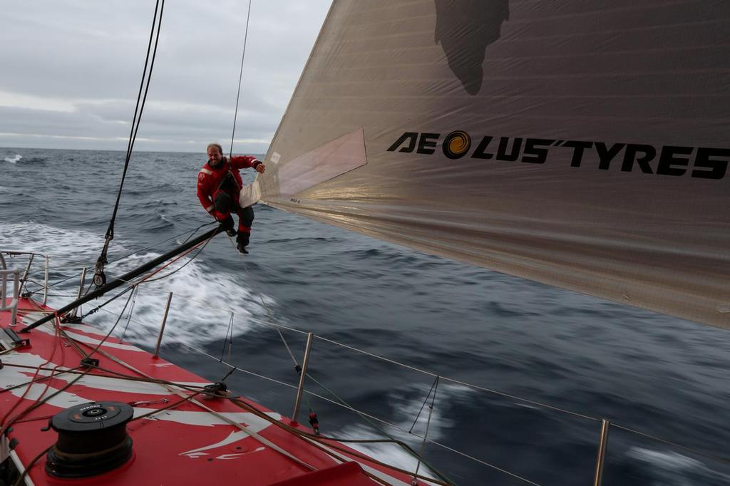November 2, 2014. Leg 1 onboard Dongfeng Race Team. Kevin Escoffier, who was just woke up for a sail change, from the bunk to the bow, but always with a smile! © Yann Riou / Dongfeng Race Team
