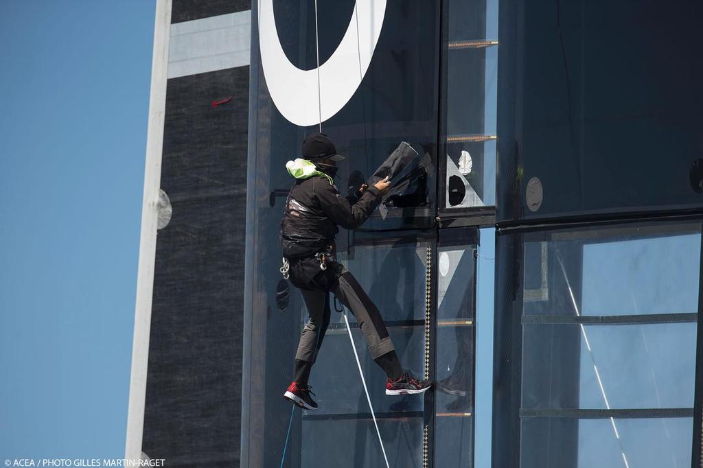 Vital pre-Race repairs on Oracle Team USA, just before the start of the final race - 34th America's Cup - Final Match - Racing Day 15
 photo copyright ACEA /Gilles Martin-Raget taken at  and featuring the  class