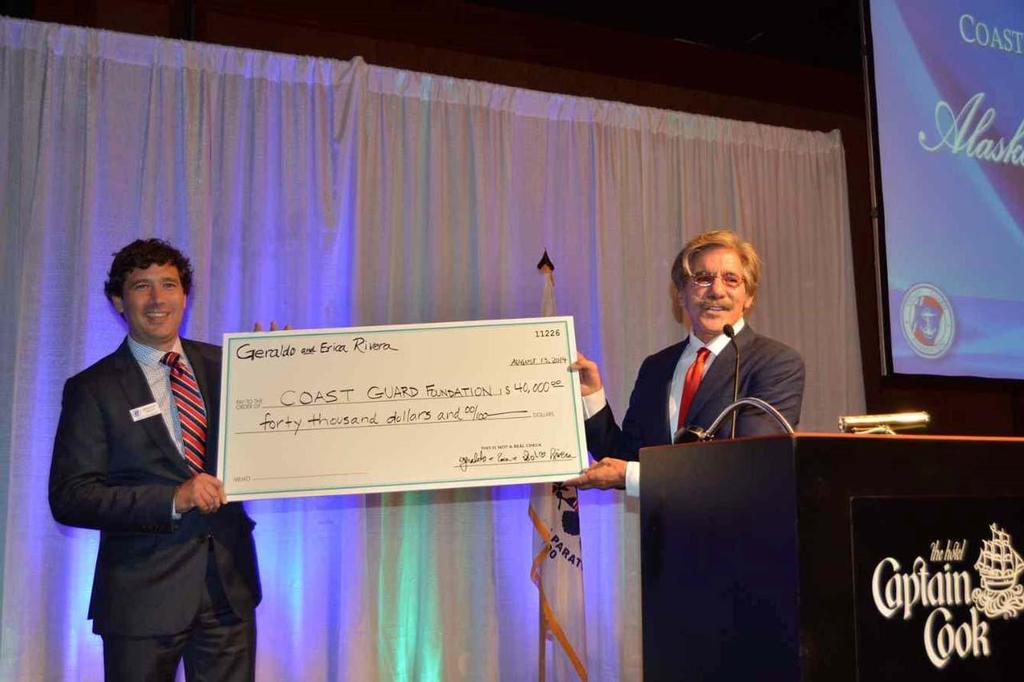 Geraldo Rivera presenting a check to the Foundation - Coast Guard Foundation Alaska Awards Dinner photo copyright  Rushton Gregory Communications http://www.rushtongregory.com taken at  and featuring the  class