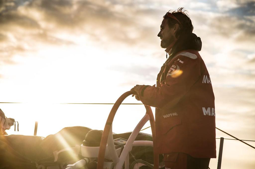 October 30, 2014. Leg 1 onboard MAPFRE. Golden moments for Iker Mart’nez during sunset on Day 19. photo copyright Francisco Vignale/Mapfre/Volvo Ocean Race taken at  and featuring the  class