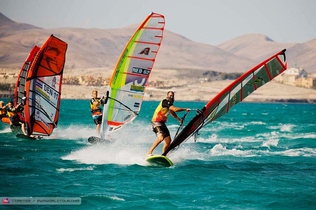 Micah at the First mark - 2014 PWA Fuerteventura Grand Slam photo copyright  Carter/pwaworldtour.com http://www.pwaworldtour.com/ taken at  and featuring the  class