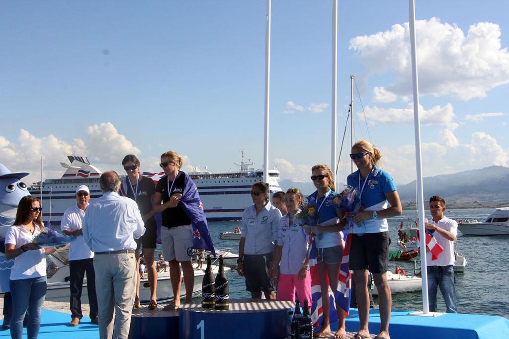 NZL 470 silver medalists receiving award - 2014 ISAF Sailing World Championships Santander photo copyright Sail-World.com http://www.sail-world.com taken at  and featuring the  class