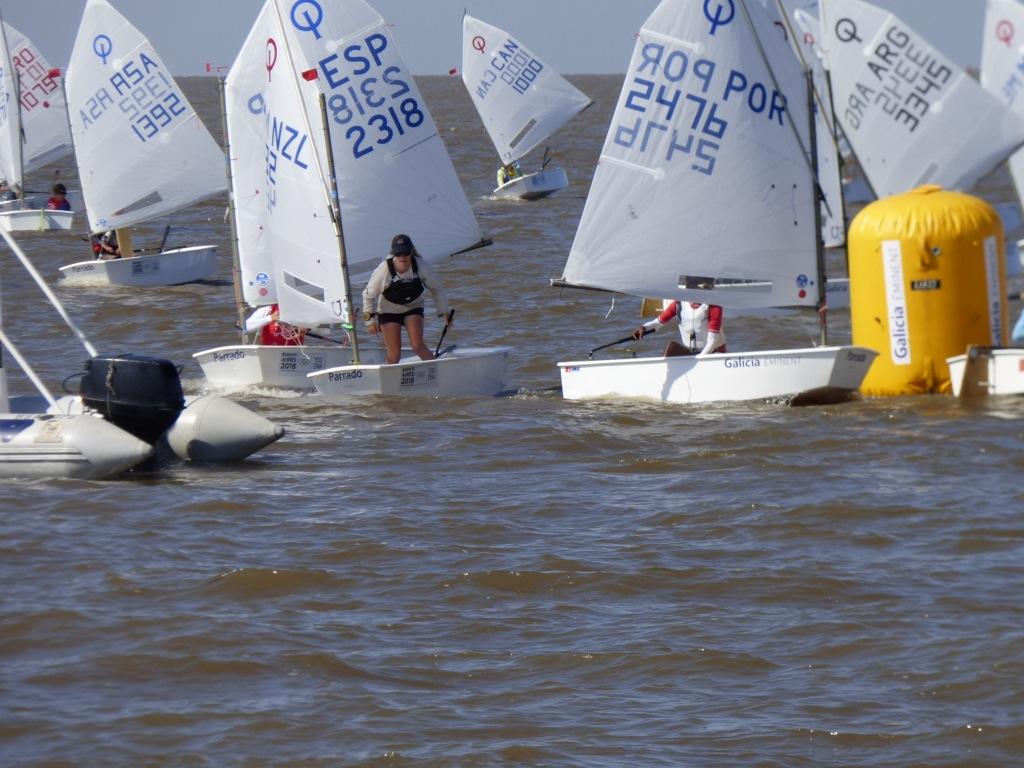Last ever mark rounding for K - NZL Yachting Trust - 2014 Optimist Worlds Team, Argentina 2014 photo copyright NZ Optimist Team taken at  and featuring the  class