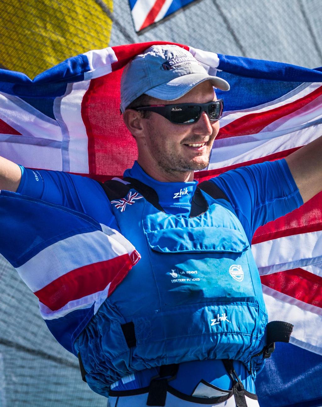Giles Scott celebrates another victory in the Finn class for the British Sailing Team photo copyright  Francisco Vignale http://www.franciscovignale.com/ taken at  and featuring the  class