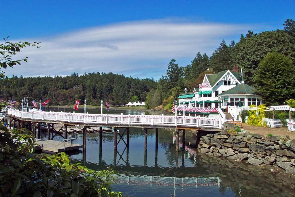 Roche Harbor Resort is a favourite destination for visitors to San Juan Island. Its restaurant is a pleasant spot to pass a summer evening, watching the activity in the harbour while enjoying a delicious meal. photo copyright Amanda Spottiswoode taken at  and featuring the  class