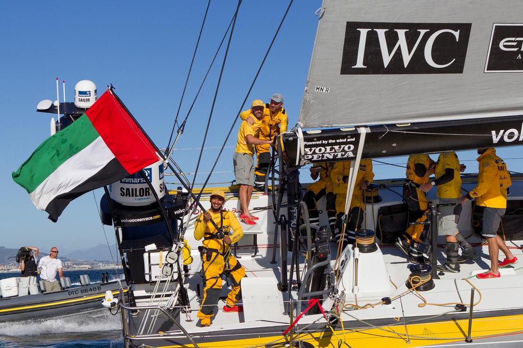 November 5, 2014. Adil Khalid on Abu Dhabi Ocean Racing celebrate after crossing the finish line in Cape Town as the winners of Leg 1. &copy; Ian Roman/Volvo Ocean Race http://www.volvooceanrace.com