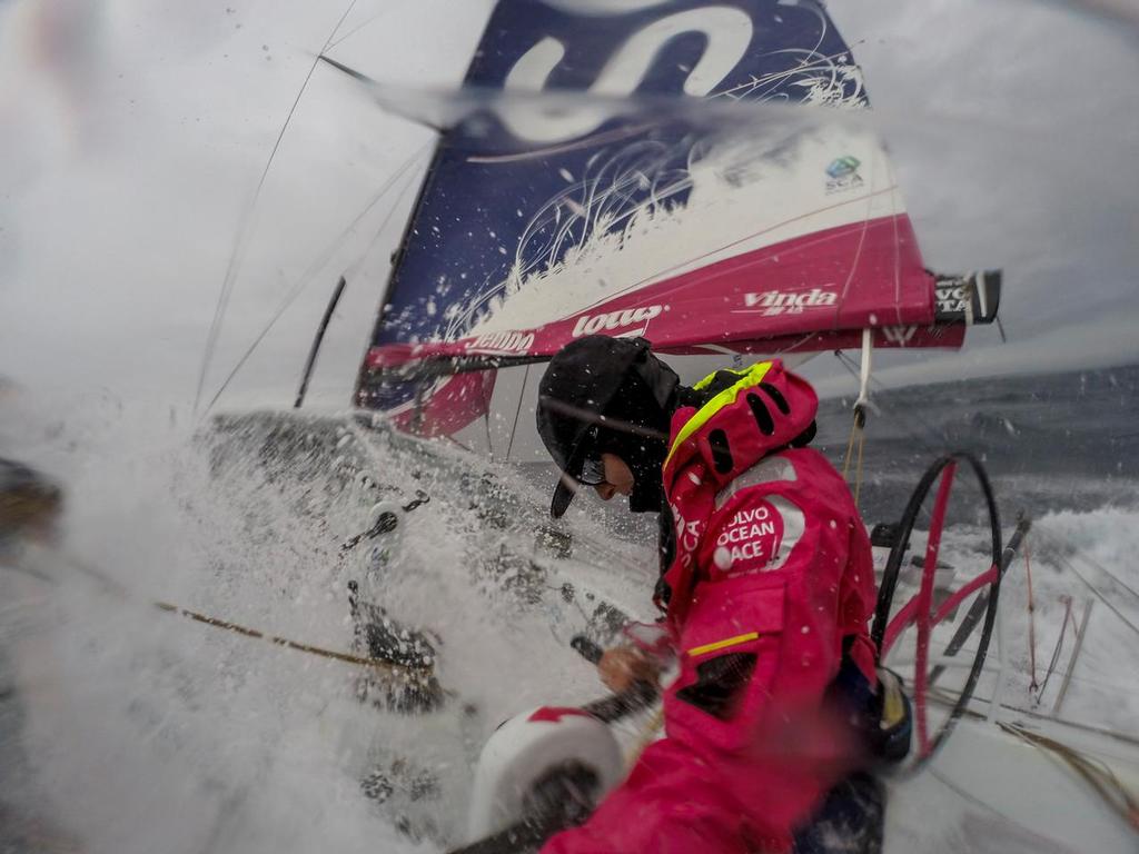 November 2, 2014. Leg 1 onboard Team SCA. Stacey Jackson prepares to take a wave during her watch. © Corinna Halloran / Team SCA