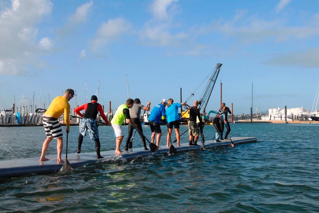 Troy Huston training the team to paddle a 20m SUP - Practice Session for Guinness World Record 'Most people on a SUP photo copyright Charles Winstone taken at  and featuring the  class