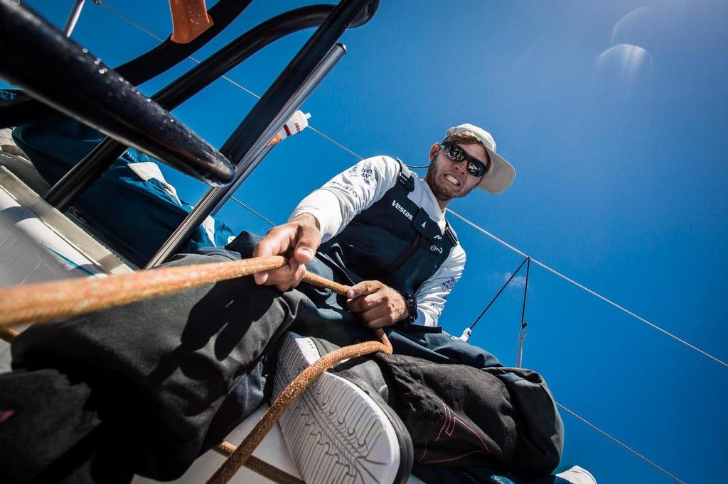October 26, 2014. Leg 1 onboard Team Vestas Wind. Tom Johnson on mainsheet trim. Day 15 at Sea. © Brian Carlin - Team Vestas Wind