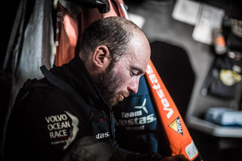 Leg 1 onboard Team Vestas Wind. Maciel Cicchetti prepares to go on deck. Day 22 at Sea.November 2, 2014.  © Brian Carlin - Team Vestas Wind