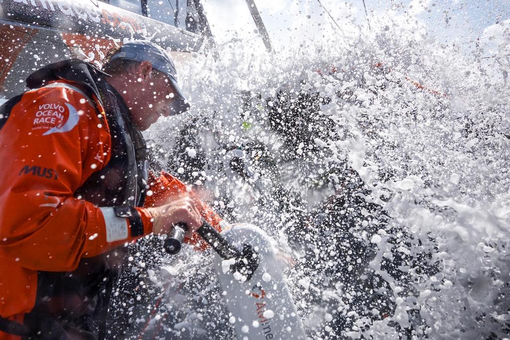 August 11, 2014. Round Britain Island Race Day 1 - OBR content: Team AlvimedicaDave Swete lowers his shoulder into some incoming aqua during the start to a windy Round Britain and Ireland Race. ©  Amory Ross / Team Alvimedica